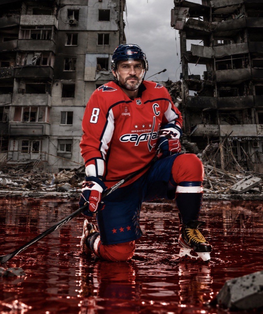Editorial photomontage: Alex Ovechkin in his Washington Capitals jersey, kneeling on a rink of blood in front of bombed-out apartment blocks.